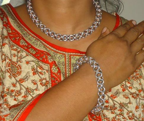 Captive Inverted Round Bracelet and Necklace