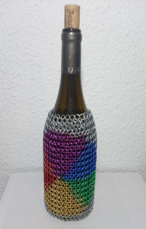Bottle with inlay