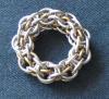 Captive 2 in 1 Chain (3.4, 4.7 AR) Formed Into a Rigid Ring.